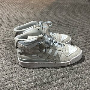 These shoes are Adidas and are in good condition and barely worn.